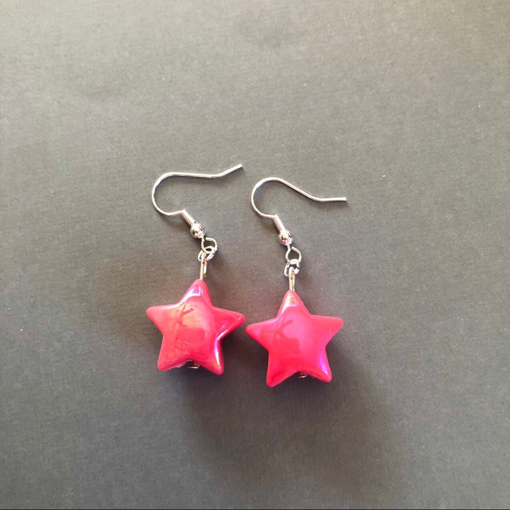 Pink color shift star earrings